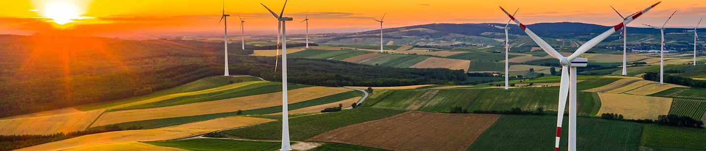 Wind turbines at sunset.