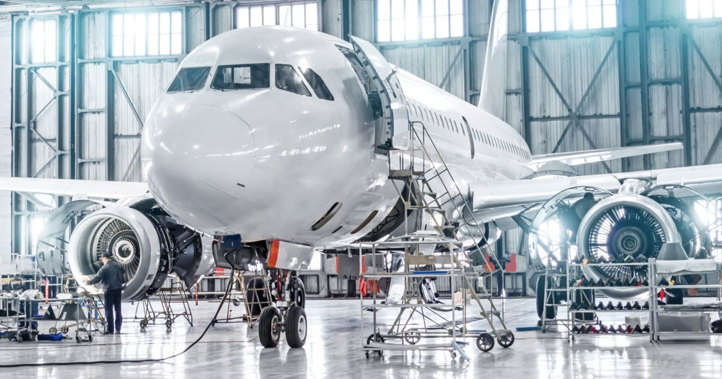 Airplane being maintained.