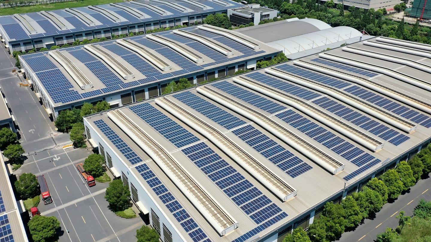 Warehouse district with solar panels on the buildings.