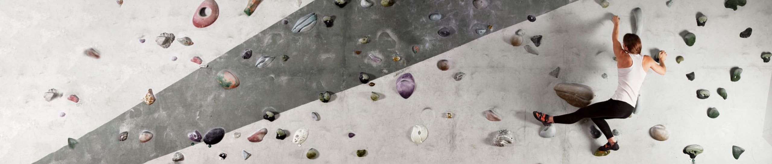 Woman Rock Wall Climbing