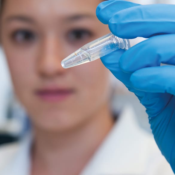 Scientist with sample.