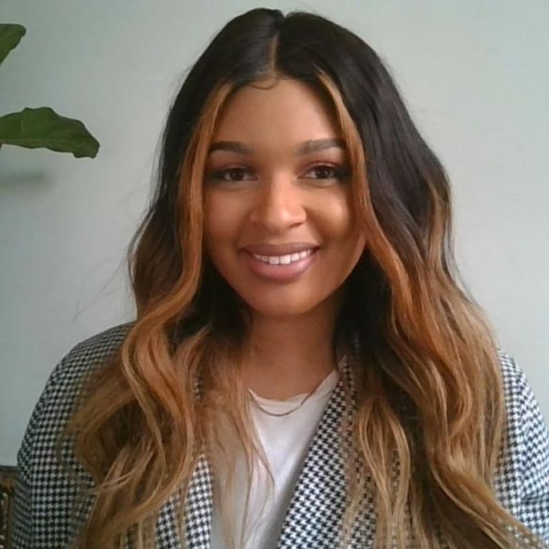 image of girl smiling with highlights in her hair