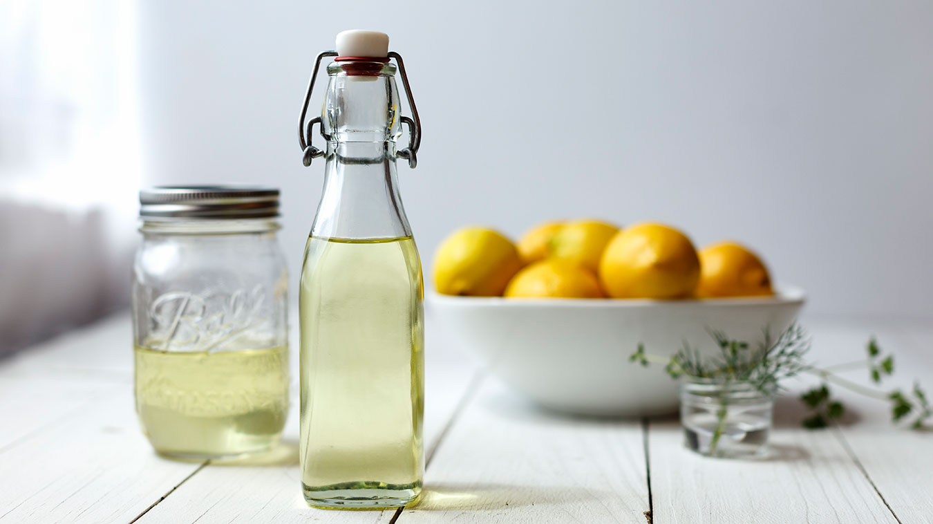 Lemon Oil with bowl of lemons