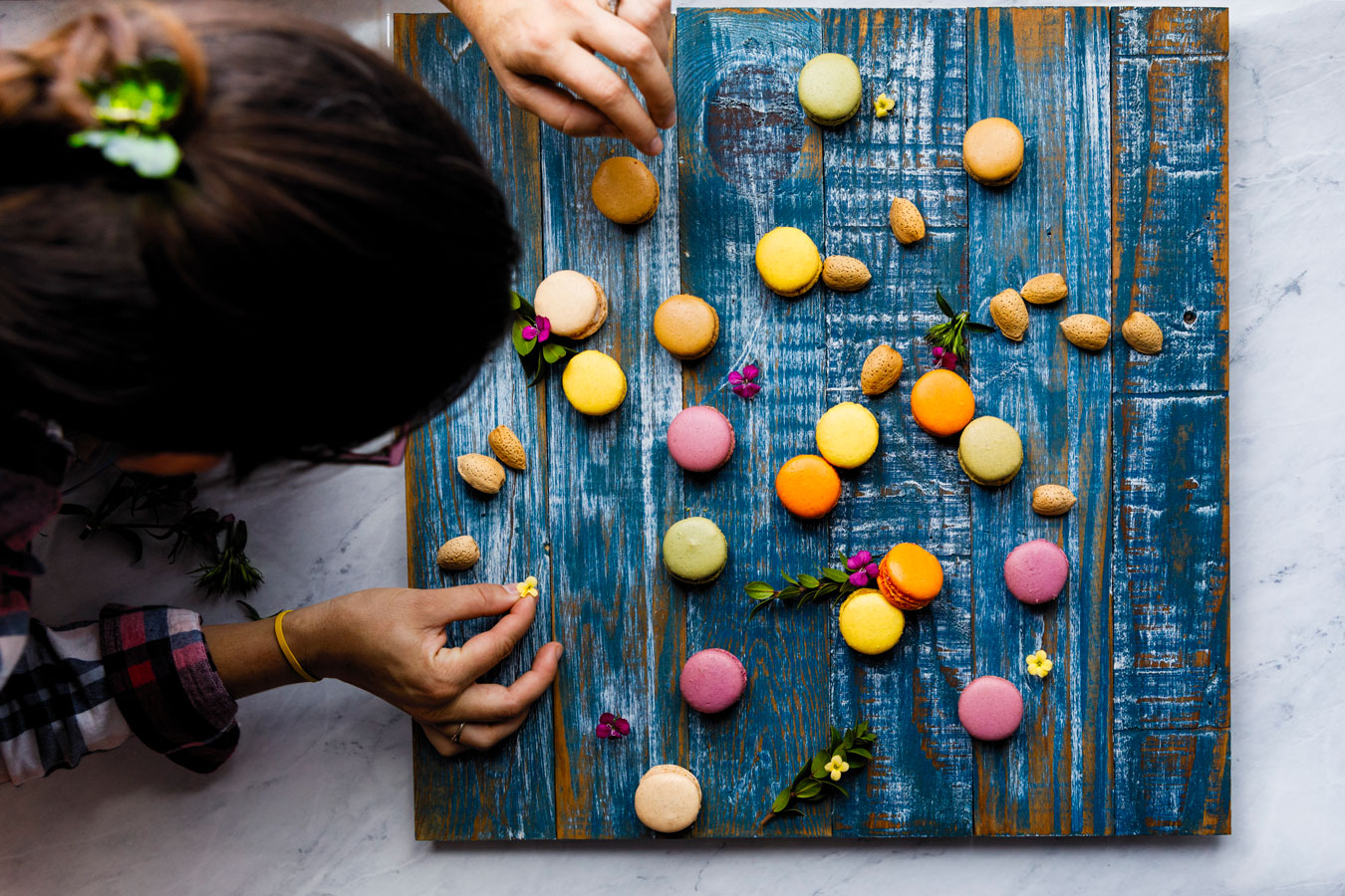 Maureen arranging macarons