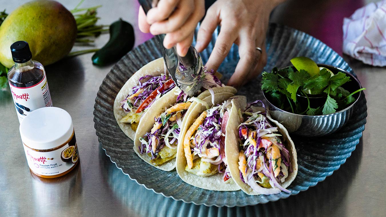 Amoretti Recipe: Fish Tacos with Mango Slaw and Chipotle Lime Aioli. Top fish with Mango Slaw.