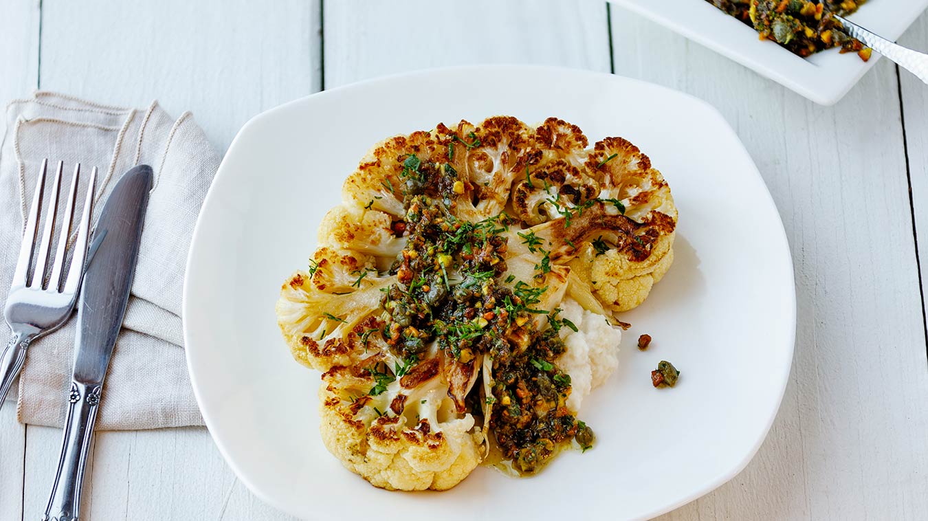 Amoretti Recipe: Cauliflower Steaks with Pistachio Caper Salsa