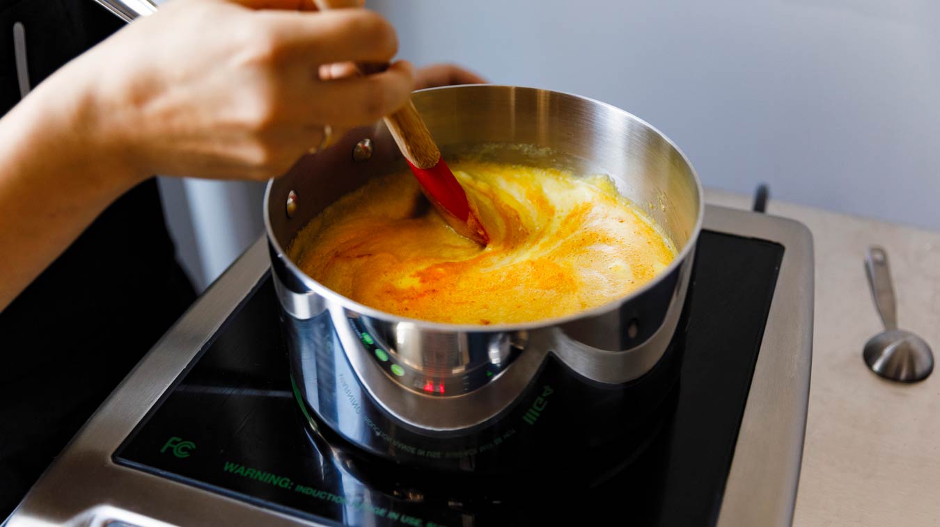 Amoretti Recipe: Coconut Shrimp with Pineapple Sauce. Cook Pineapple Sauce until thick.