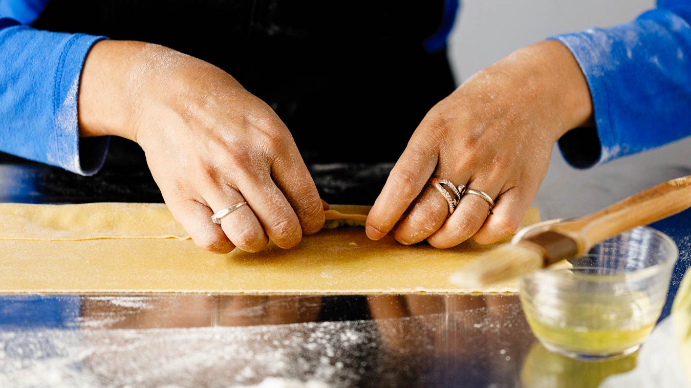 Amoretti Recipe: Agnolotti. Fold edge tightly over filling.