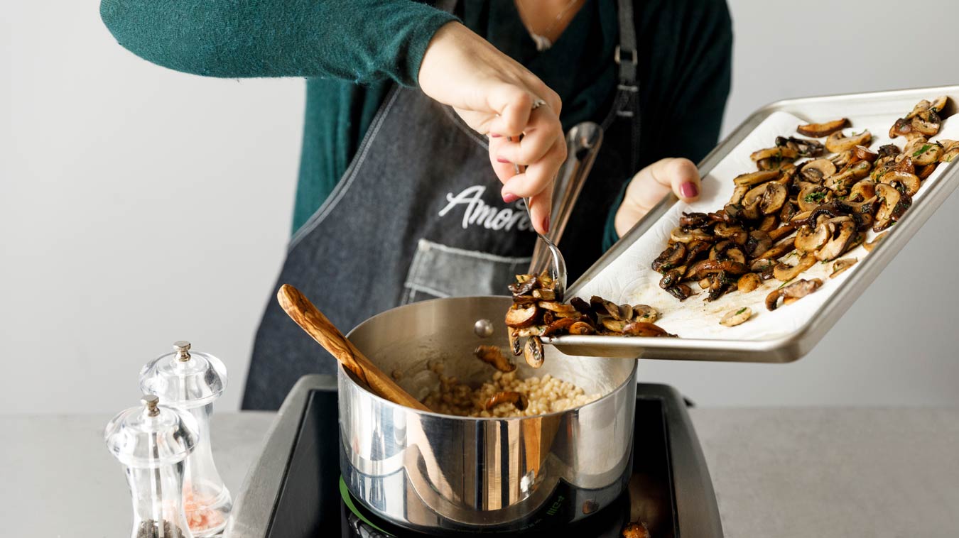 Amoretti Recipe: Barley Risotto with Mushrooms and Parmesan. Add mushrooms.