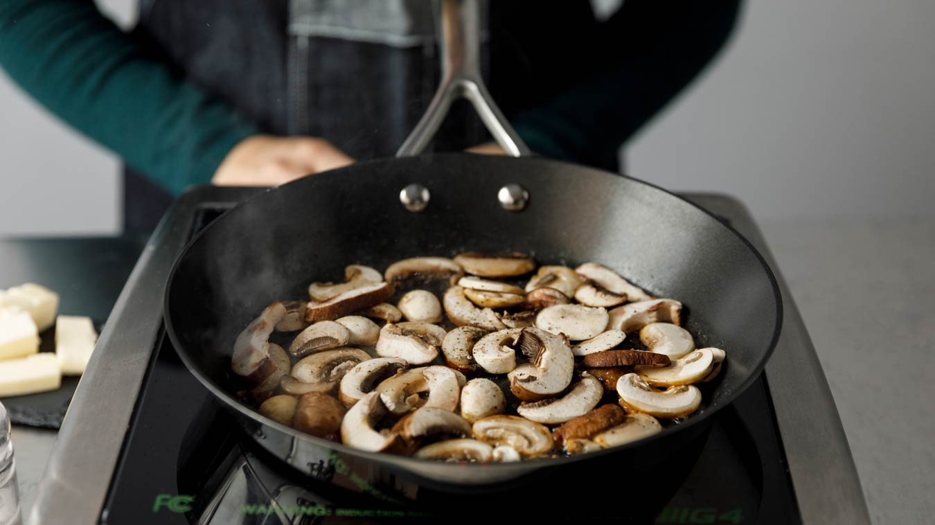 Amoretti Recipe: Barley Risotto with Mushrooms and Parmesan. Single layer of mushrooms.