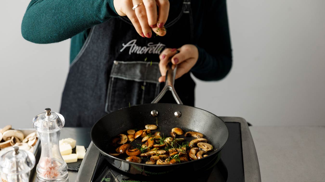 Amoretti Recipe: Barley Risotto with Mushrooms and Parmesan. Season with herbs.