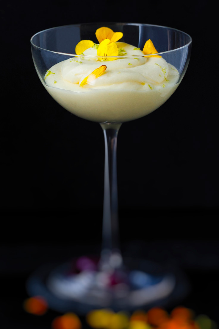 Amoretti Tropical Citrus Mousse Recipe decorated with yellow edible flowers