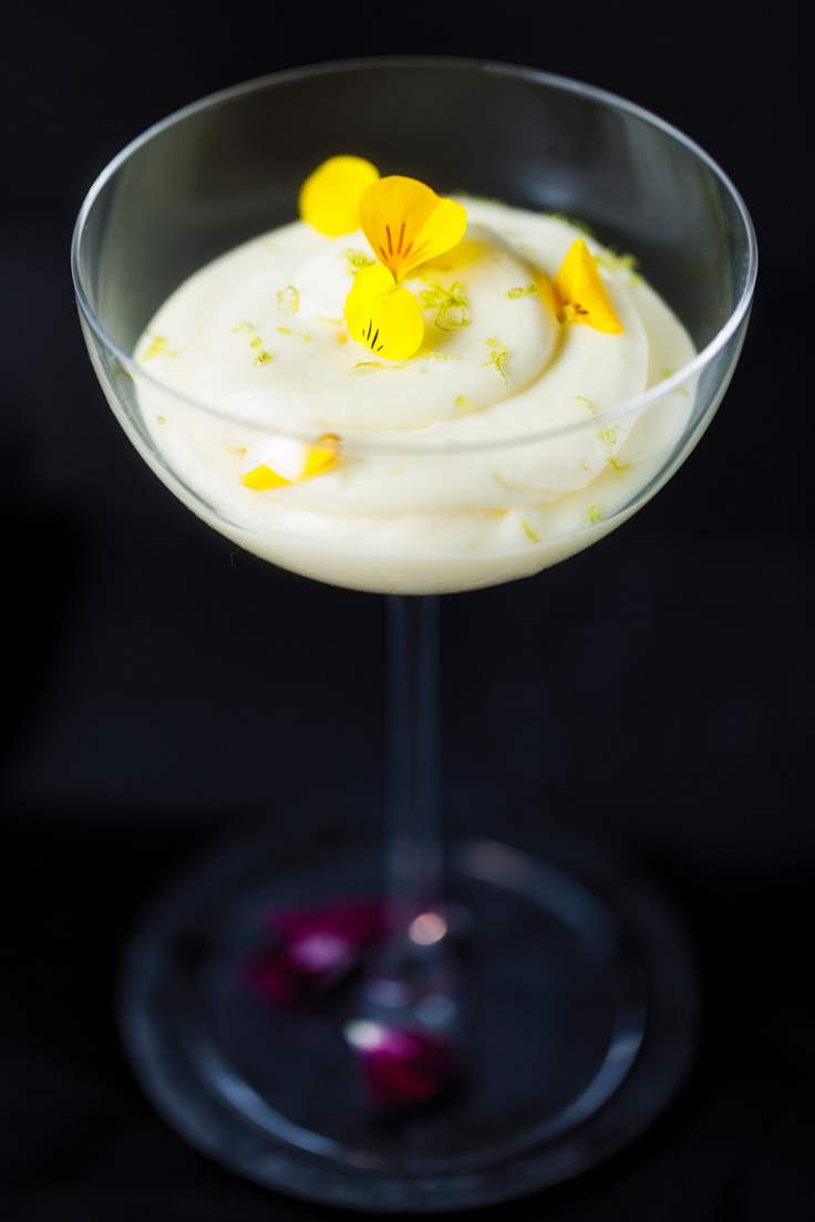 Amoretti Tropical Citrus Mousse Recipe decorated with yellow edible flower petals