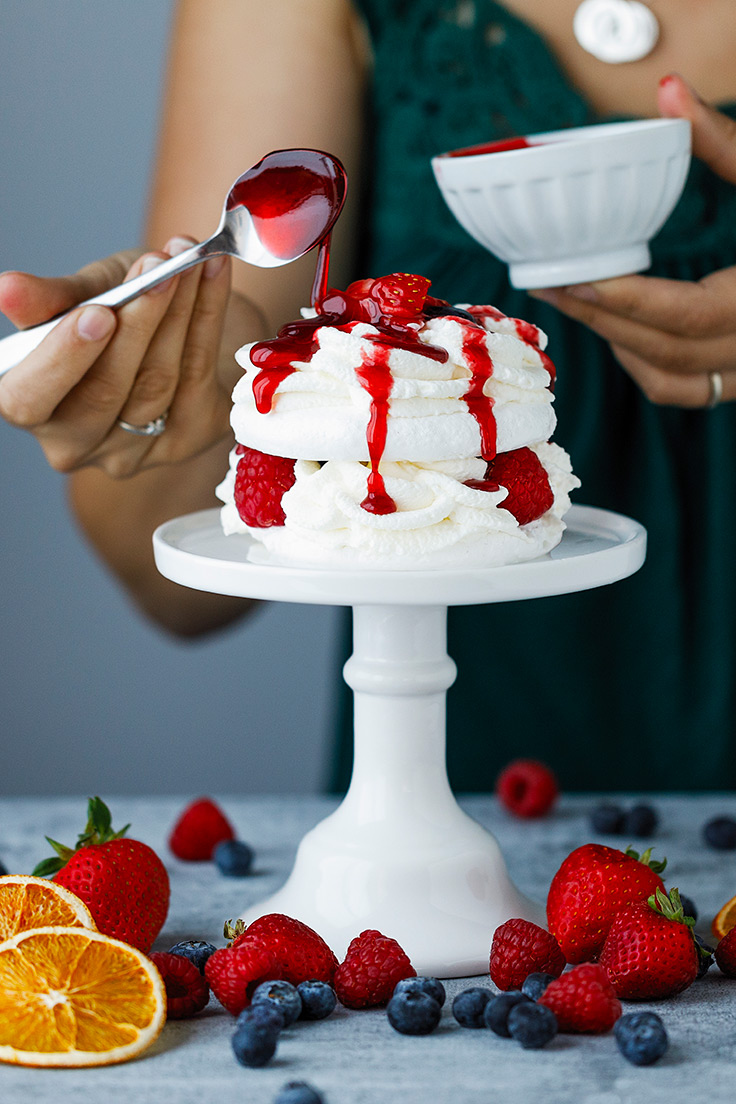 Amoretti Pavlova with Fresh Berries Recipe drizzled with Raspberry Swirl