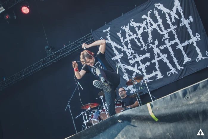 A gallery of photos of Napalm Death on August 9, 2025