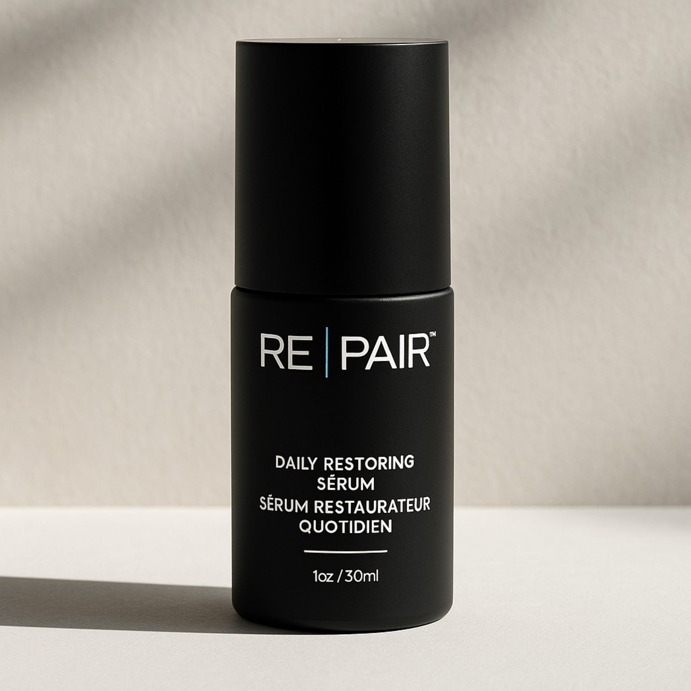 RE|PAIR restoring face serum bottle