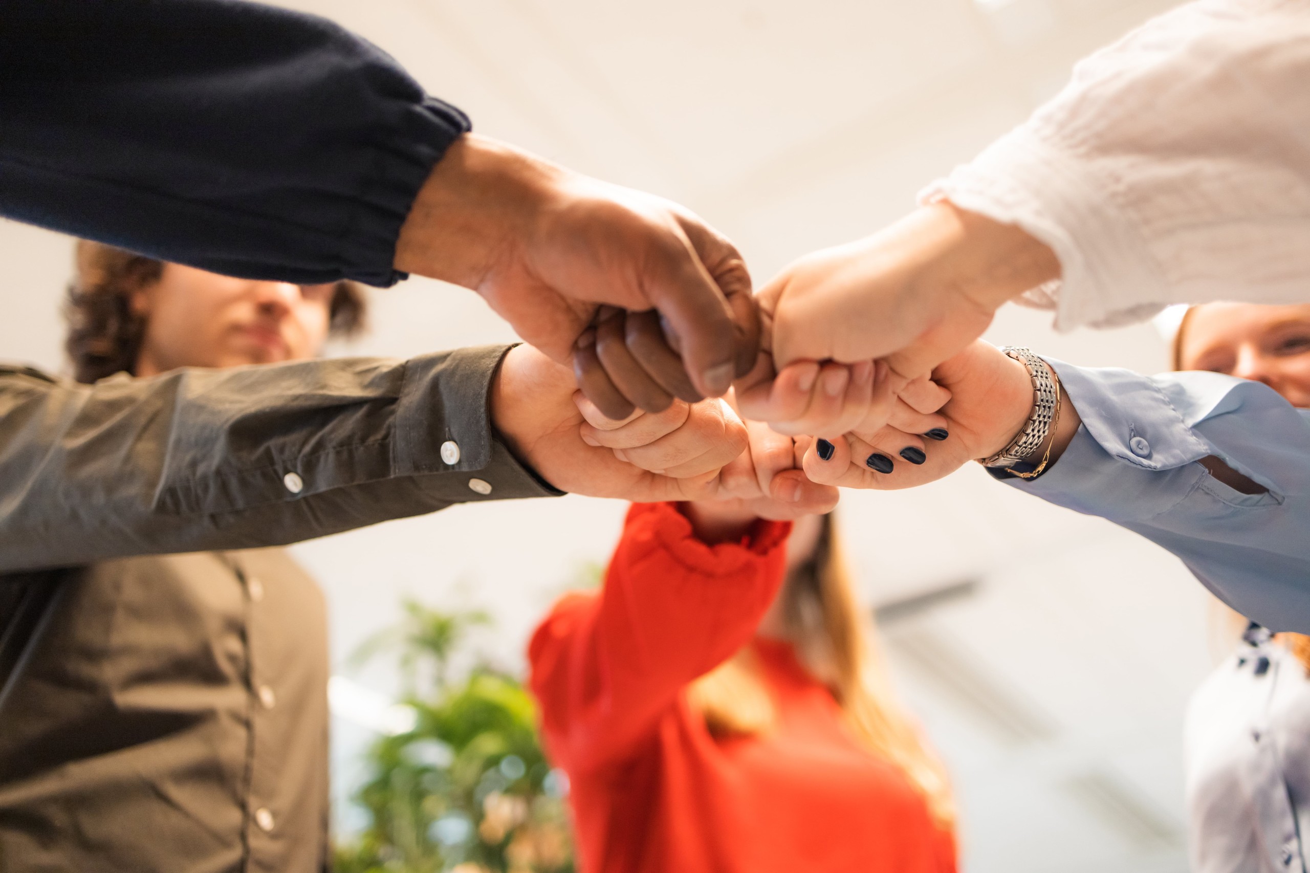 ANAGO_Corporate_Hands_together_team_feeling_cropped_300dpi-min.jpg