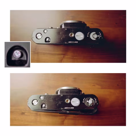 The Nikon F2 bottom plate. Top: film door closed. Bottom: film door open.