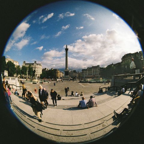 Trafalgar Square and Nelson’s Column — the theatricality of the monumental. Evening sun. 