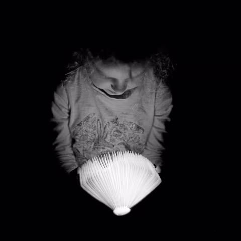 Some items in our homes may appear enchanting on film, particularly if they emit light like this: “This is Mabel, my partner’s daughter, ‘reading’ a novelty light book that I use as a bedside lamp.” — Martin Beech.