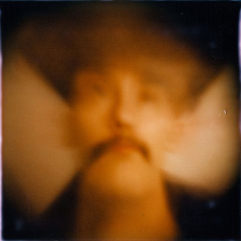 My self-portrait, taken on a gingerbread film camera though a sugar lens.