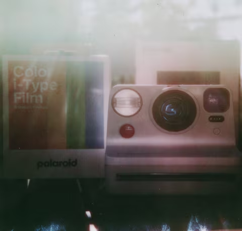 I am giving away my Polaroid Now I-Type camera and a fresh pack of film.