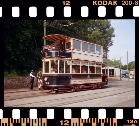35mm film scan with Myriad (inc. sprocket holes and edge markings).