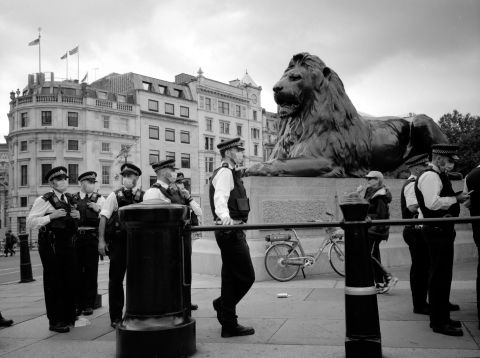 All the police wearing face masks at the COVID skeptics protest on 30 August 2020 in Trafalgar Sq., London. Taken with a Fujifilm GA645Zi on Shanghai GP3 120 film, 100 ISO. Developed for 1 hour in Rodinal 1 + 100 solution, at 20 degrees Celsius.