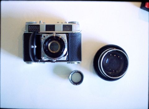 Kodak Retina IIIC with interchangeable lens elements. Pictured: native 50mm element and a much larger 80mm attachment.