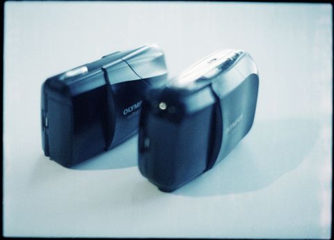 Olympus Mju II Stylus Epic (left) and its older cousin: Olympus Mju Infinity Stylus (right).