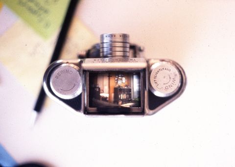 A top view of a 35mm TLR — Bolsey Model C. The image that you see through the viewfinder is reversed left-to-right.