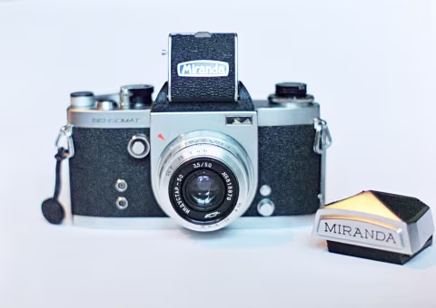 Industar-50 on Miranda Sensomat film SLR via an M44 to M39 lens adapter with a chest-level viewfinder. In this configuration, this camera is pocketable*.