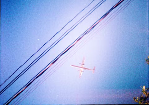 A photo of a rotary engine plane, shot in Toronto (point of departure for Jacob) about six years ago on Diana Mini with some type of Lomography-branded film.