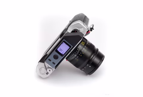 Rveni Labs made a special holder that adapts a portable laser rangefinder device to film cameras.
Zone focusing isn’t d…