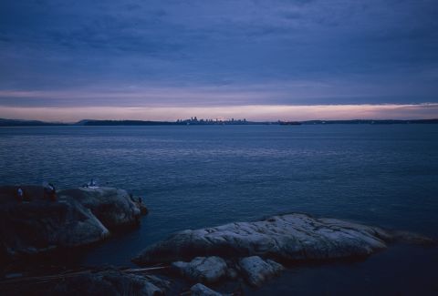 Last few rays of the summer sun reflecting off Mt. Baker behind the downtown Vancouver skyline. From the same roll as the topmost photo.