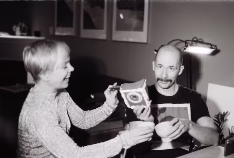 Yvonne and I doing “cheers” with some coffee and gingerbread camera bits. Don’t get confused by the spoon which is a part of my T-shirt design.
