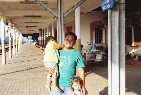 A nice guy with his kids at Chumphon Railway Station. Shot with Yashica FX3 Super 2000 on Kodak Color Plus 200.