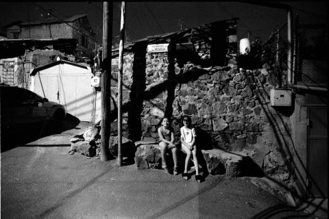 I love to photograph outdoors, in the favelas.