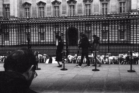 People at the gates, Buckingham Palace, London, 9-10 April 2021. Taken with the Canon EF camera and an NFD 50 mm f./1.4 lens on Eastman Double-X film.