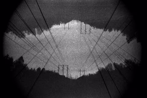 “Like Antennas to Heaven…" (2020) — double-exposure, shot with Ilford Delta 3200, Nikon F100, and 55mm macro lens.