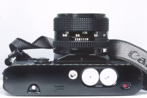 Dual battery compartments and no provision for a motor drive.  Photograph taken with a Nikon F5 and a Macro Tokina AF 100 mm f./2.8 lens on Fujichrome Provia 100F.