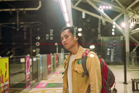 Self-portrait of a night traveller. Shot on Ricoh 500 GX with Kodak Portra 400.
