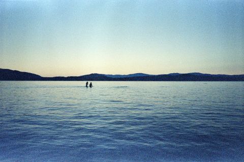 Kodak Ektachrome 200 (expired in 1994, cross-processed in C-41) with Yashica T5. Saltery Bay, Sunshine Coast. The couple you see in the distance swam to a rock submerged by the high tide. Around that rock, there’s about two metres or six feet of water. And when the tide is low, the stone is nearly fully exposed.