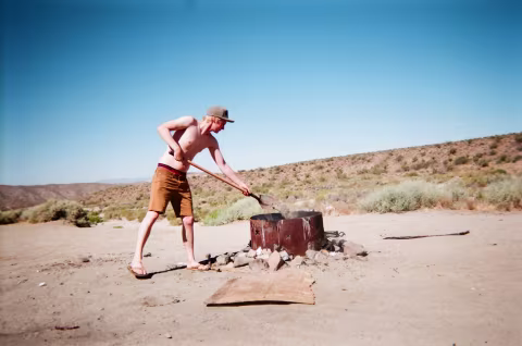 Dylan tending to the fire.