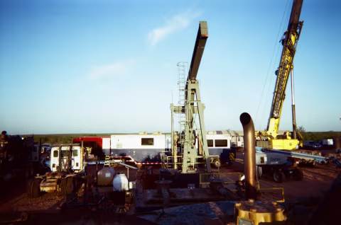 Production well in middle of Frac spread. DataVan in background.