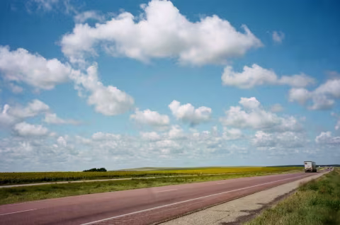Big Midwest skies and sunflower fields.