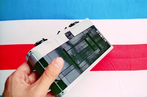 LEGO ZH1’s film door closes tightly, appearing flush with the body. It lets no light through while keeping the film perfectly flat. It even has a film memo holder on the back!