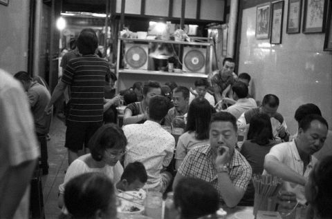 This photo was taken at an incredibly busy “hole in a wall,” which only served phở. There are no individual tables. Get in, get out. The food is delicious.