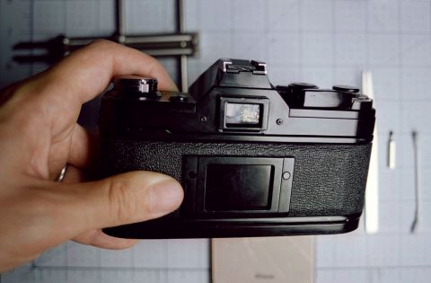 Any glass surface can get infected with fungus — not just the lens. Here, you can see it inside the Canon AE-1 camera viewfinder.
