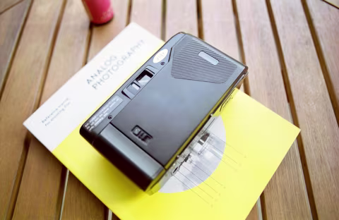 Yashica T2 back: pull the plastic on the left down to open the film door.